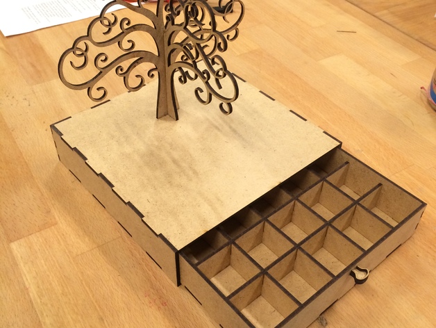 Wooden jewelry box with drawers and ornamental tree stand