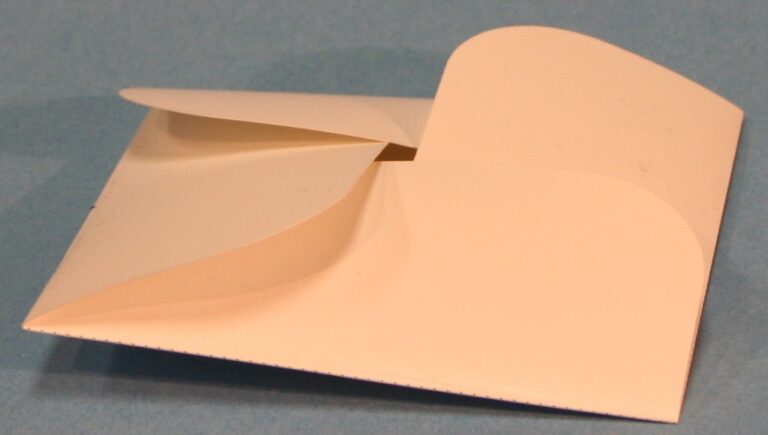 Peach paper gift box template folding into four curved petal flaps