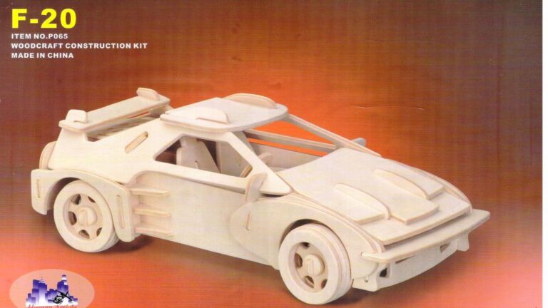 White slotted sports car model with wide wheels and rear wing