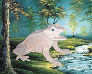 Slotted wooden frog puzzle model standing beside a pond scene