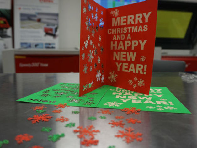 Red Christmas greeting card with snowflakes and holiday text