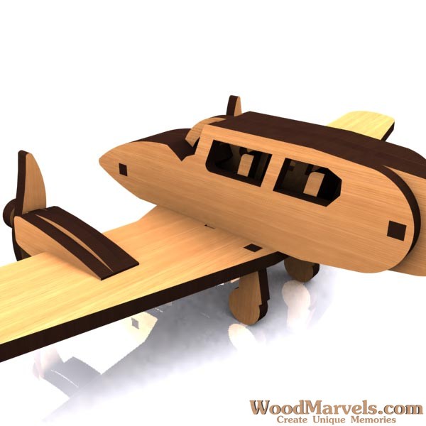 Wooden Piper-style model airplane shown from front side angle
