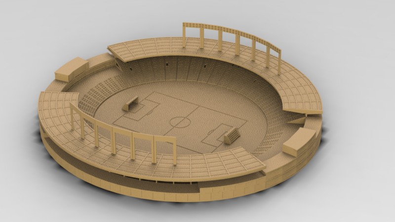 Round laser-cut stadium model with tiered seating and a football pitch