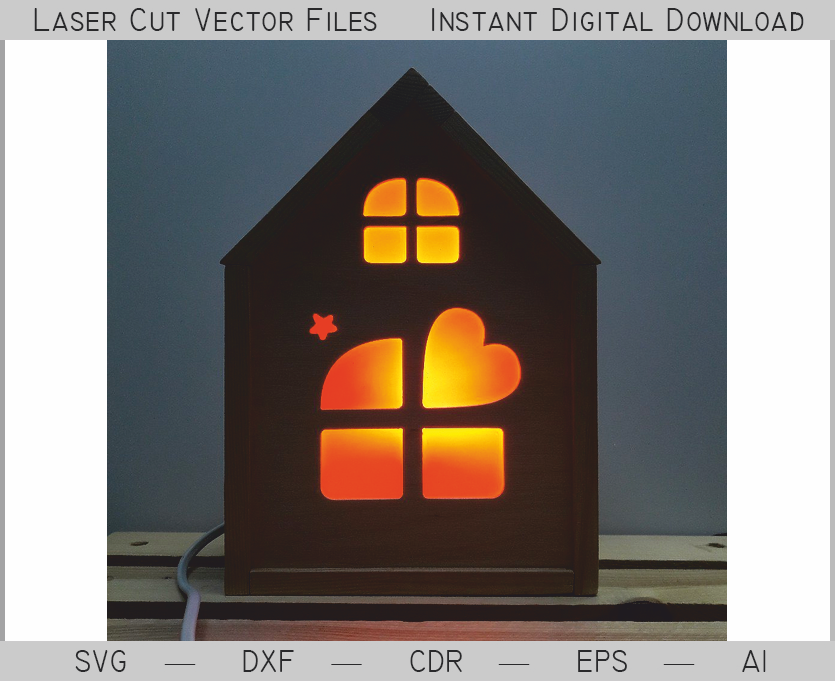 House-shaped nightlight with a glowing heart-divided lower window and small upper window