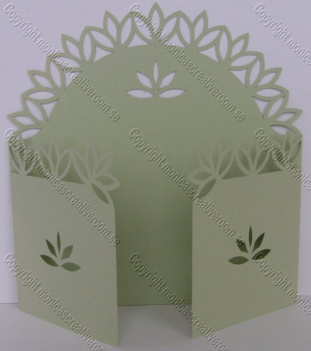 Pale green gatefold card with a pointed leaf crown and small leaf cutouts