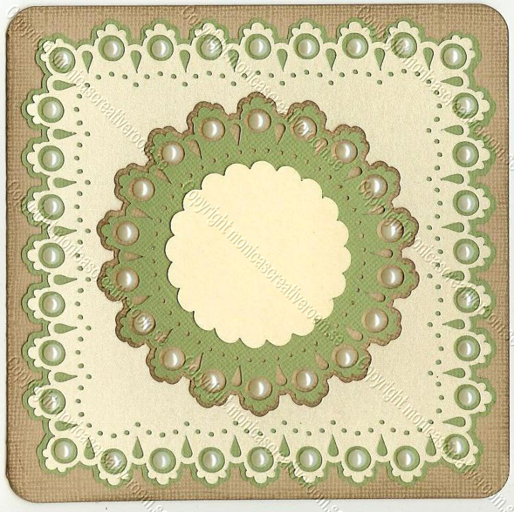 Pale green square card with a lace border and concentric scalloped circles