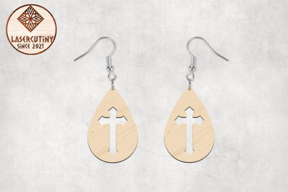 Wood-colored teardrop earrings with open cross cutouts and metal hooks