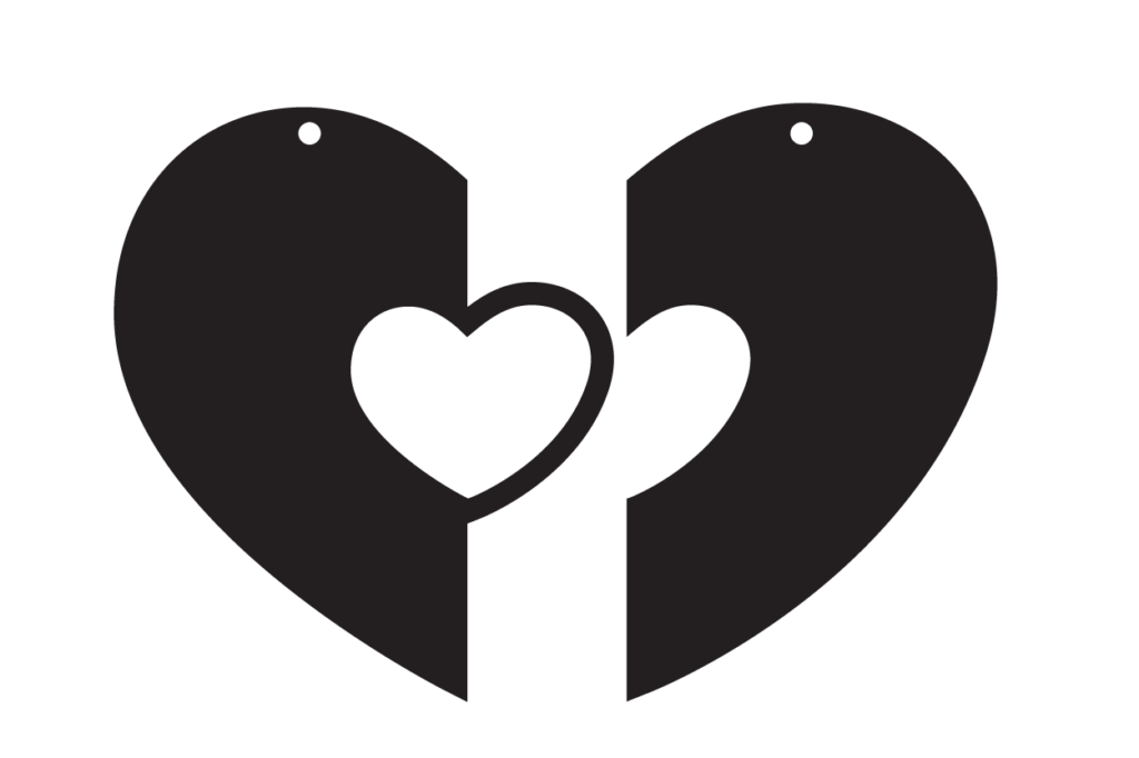 Two matching heart keychain halves with top ring holes and a central heart opening