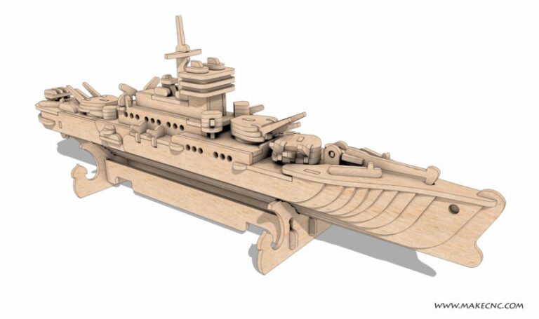 Wooden warship display model with turrets, a mast and a curved bow